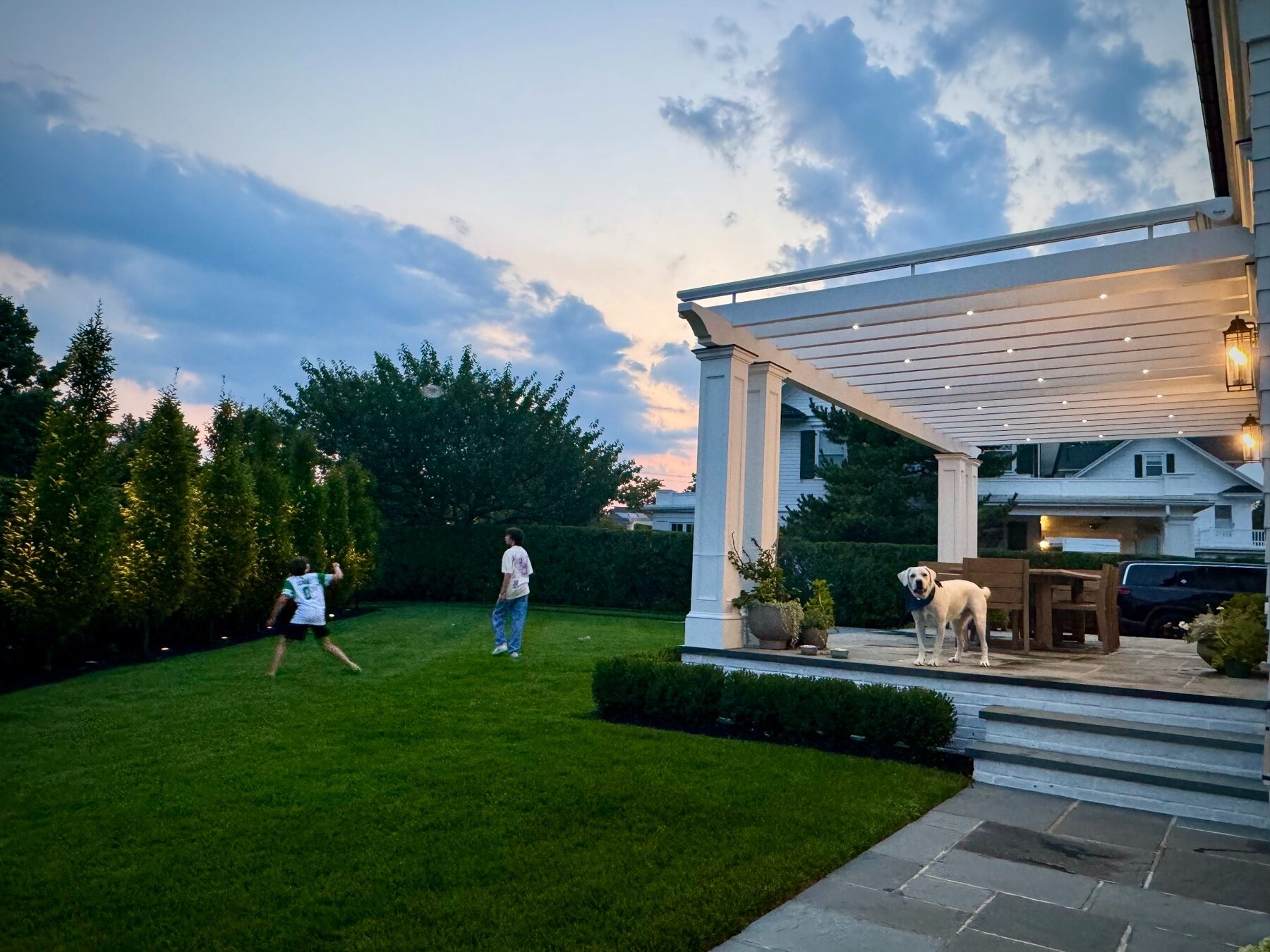 Family terrace and lawn at a managed residence